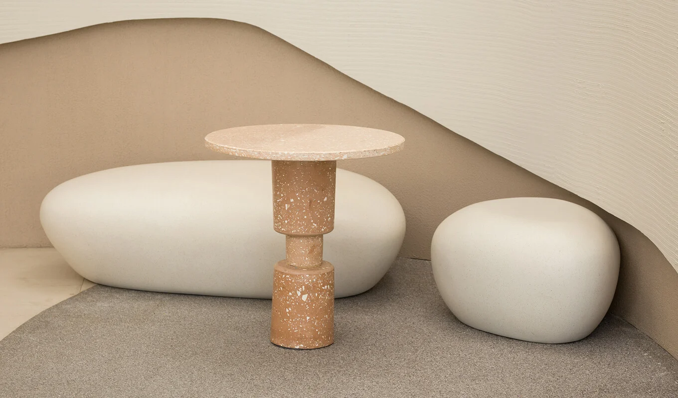 a minimalist interior featuring uniquely textured furniture