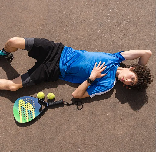 young sportsmen portrait posing outdoor lying